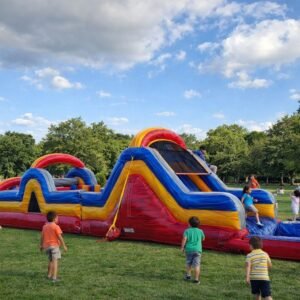 nflatable 72-foot obstacle course water slide rental with dual slides and climb features in Katy and fulsehar TX backyard
